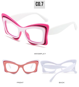 Detail view of butterfly cat eye glasses frames in layered magenta and black colors
