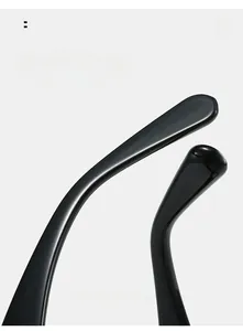 Detail of glossy black curved temple tips designed for comfortable and secure eyewear fit
