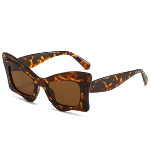 Lunettes de soleil papillon rétro surdimensionnées avec monture écaille et verres bruns