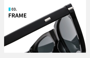 Detail of glossy black sunglass frame with silver rectangular metal hinges on temple
