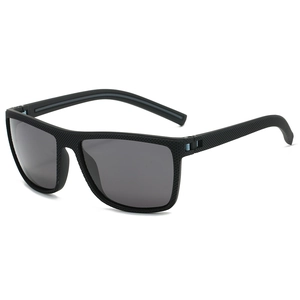 Polarized sports sunglasses in black with carbon fiber texture and blue hinge detail
