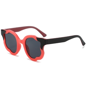 Occhiali da sole ovali a forma di fiore per bambini in audace design a contrasto rosso e nero