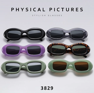 Retro oval sunglasses in various colors including black, tortoise shell, and pastel green
