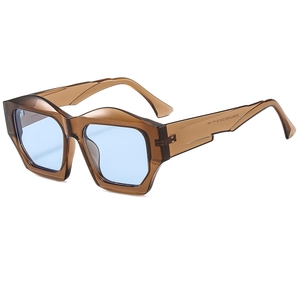 Polygonal oversized sunglasses with brown translucent frame and light blue lenses