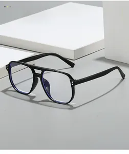 Macro view of black pilot double-bridge glasses frame with anti-blue light lenses