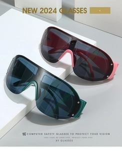 Macro detail of oversized outdoor sunglasses with metallic rivets and gradient lenses