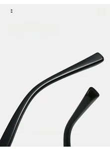 Detail of curved black gloss glasses legs showing arc comfortable wear design