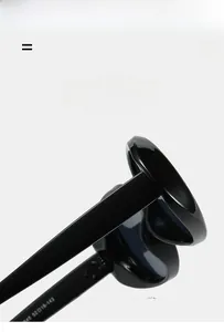 Detailed close-up of oval sunglasses showing sturdy hinges and temple size engraving