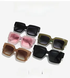 Detail showing five assorted oversized square sunglasses with gradient lenses and bold frames
