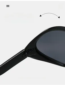 Macro detail of high-quality durable hinge on polished black oversized sunglasses