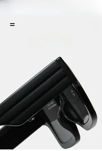 Close-up of polished black frame hinges showing high-quality elastic texture material