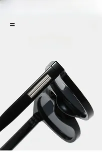 Close-up of flexible temple hinges and silver metal stripes on black oval sunglasses