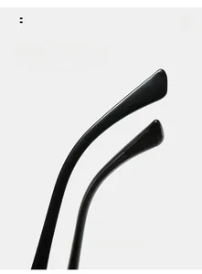 Detail of ergonomic curved black sunglass temples with anti-slip textured finish