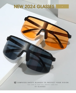 Detail view of colorful outdoor cycling sunglasses with impact-resistant wrap frames