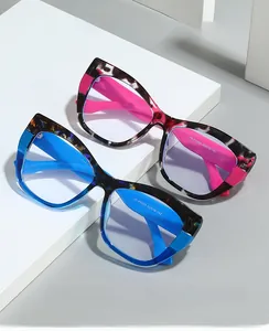 Detailed view of TR90 cat-eye frames showing pink and blue tortoiseshell patterns