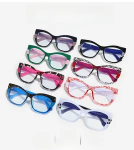 Multiple styles of TR90 cat eye frames with colorful patterns and anti-blue light lenses