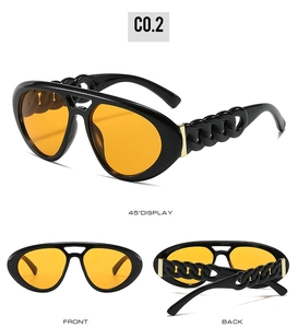 Détails de lunettes aviateur avec verres orange et branches en forme de chaîne épaisse