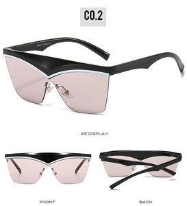 Black oversized butterfly sunglasses with silver top trim and pink gradient lenses