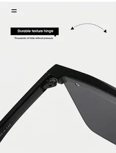 Detail shot of durable metal hinge and 38-0-140 size markings on black polygon sunglasses