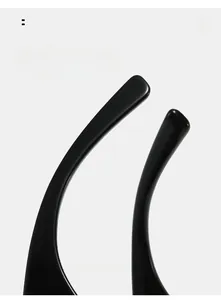 Detail of curved black sunglasses arms with ergonomic design and smooth finish