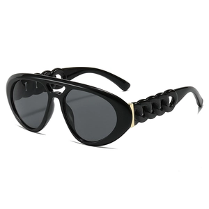 Lunettes aviateur noires à double pont avec branches en chaîne épaisse et accents dorés