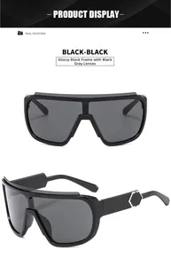 Detail of glossy black cycling sunglasses with silver hexagonal hinge ornament