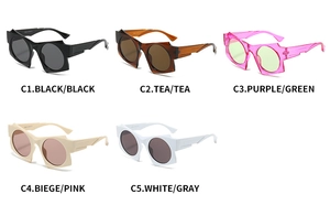 Flat lay of five geometric irregular sunglasses in black, tea, purple, beige and white