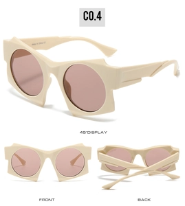 Detail view of beige geometric sunglasses with irregular frames and dark pink lenses