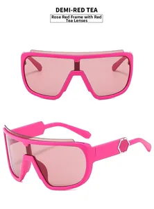 Detail view of rose red oversized sunglasses with tea lenses and hexagonal metal accents