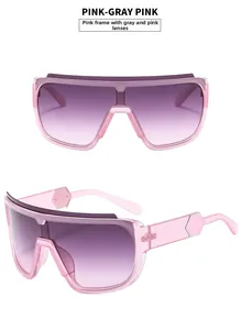 Detail of pink jelly frame sunglasses with silver hexagonal metal accents on temples