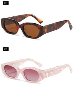 Detail view of tortoiseshell and pink marble irregular sunglasses with oval frames