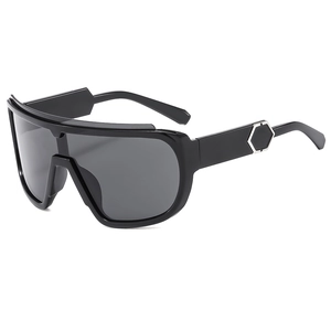 Polished black cycling sunglasses with one-piece wrap lens and silver hexagon detail