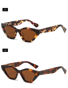 Détail de lunettes de soleil œil de chat en écaille colorée avec verres marrons