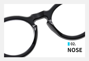 Detail of high-gloss black round glasses frame featuring integrated nose pads and bridge
