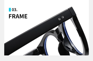 Close-up of polished black oversized round frame with silver rivet hinge detail