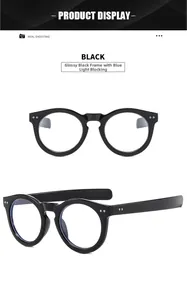 Detail view of oversized bright black round glasses with anti-blue light lenses and rivets