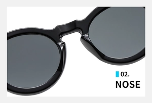 Gros plan sur les plaquettes de nez intégrées des lunettes de soleil rondes vintage