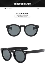 Détails de lunettes de soleil rondes rétro avec monture noire et rivets argentés