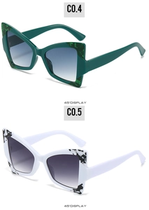 Lunettes de soleil papillon oeil de chat en montures vert foncé et blanc fleuri