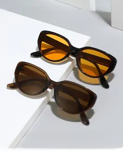 Close-up of stylish cat-eye sunglasses with protective lenses and retro frames