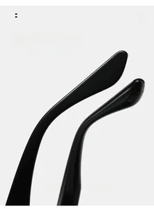 Detail view of glossy black curved mirror legs for comfortable wear on cat eye sunglasses