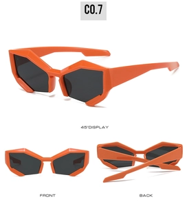 Detail view of orange geometric sunglasses with black lenses and cut-edge frames
