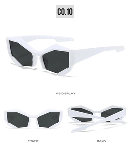Detail view of white geometric rimless sunglasses with jagged frames and dark lenses