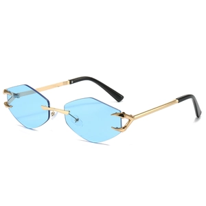Lunettes de soleil sans monture bleu losange avec monture dorée et griffes d'aigle