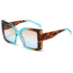 Fashionable oversized square sunglasses with tortoiseshell and blue gradient frames
