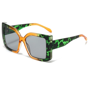 Fashion oversized square sunglasses with vibrant green leopard print and orange gradient frame