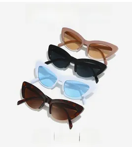 Detail view of four cat-eye sunglasses in pink, black, white, and leopard patterns