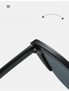 Detail of durable metal hinges on black cat-eye sunglasses for long-lasting wear