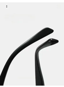 Detail shot of black curved cat-eye sunglasses temples with high-gloss finish for comfort