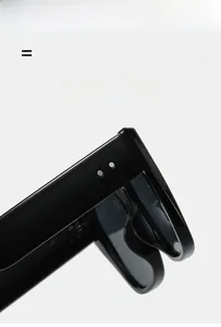 Close-up of lightweight black square sunglasses with silver metal rivets on hinges